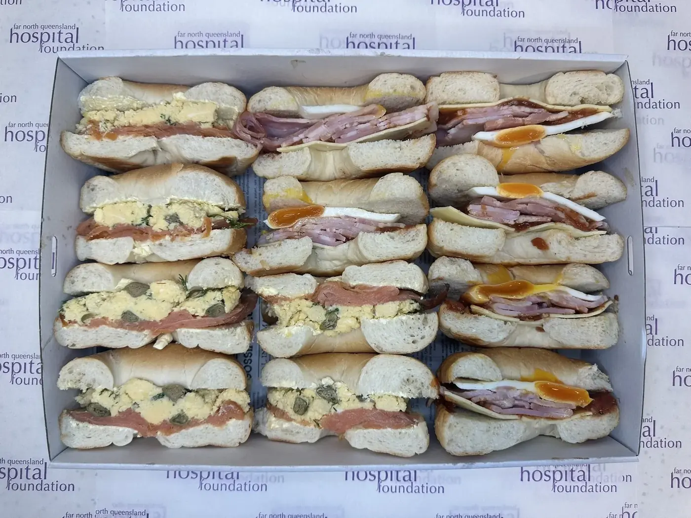 Bagels and Turkish bread rolls packed in catering boxes for a Cairns office delivery